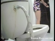 Baba with beautiful butts pee in the toilet